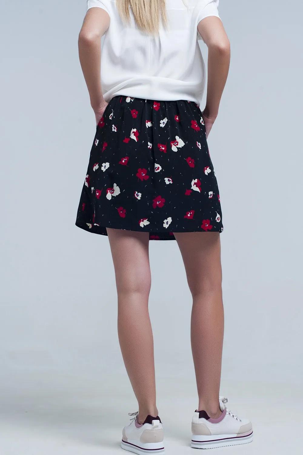 Black mini skirt with floral pattern